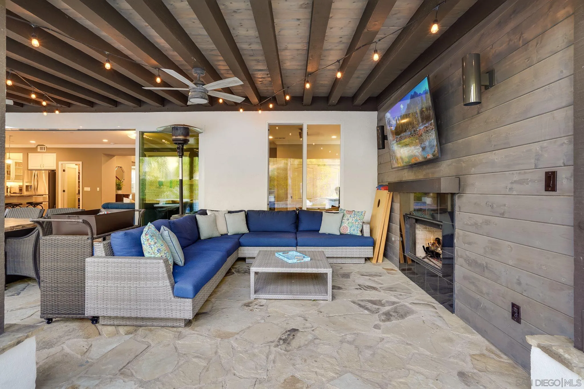 16375 Cayenne Ridge Road San Diego, CA 92127 - Photo 32 of 35 a living room with furniture and a fireplace