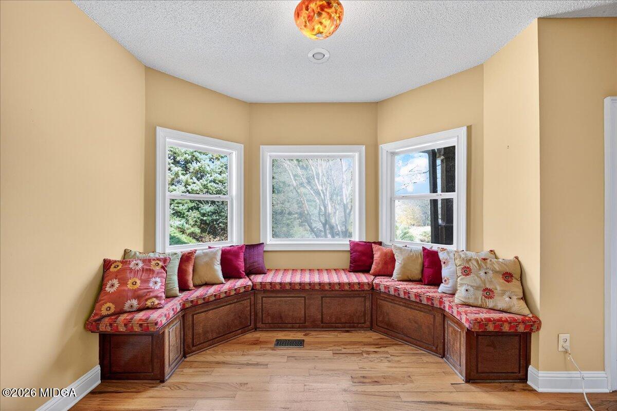 518 River Overlook Forsyth, GA 31029 - Photo 23 of 96 a living room with furniture and a large window
