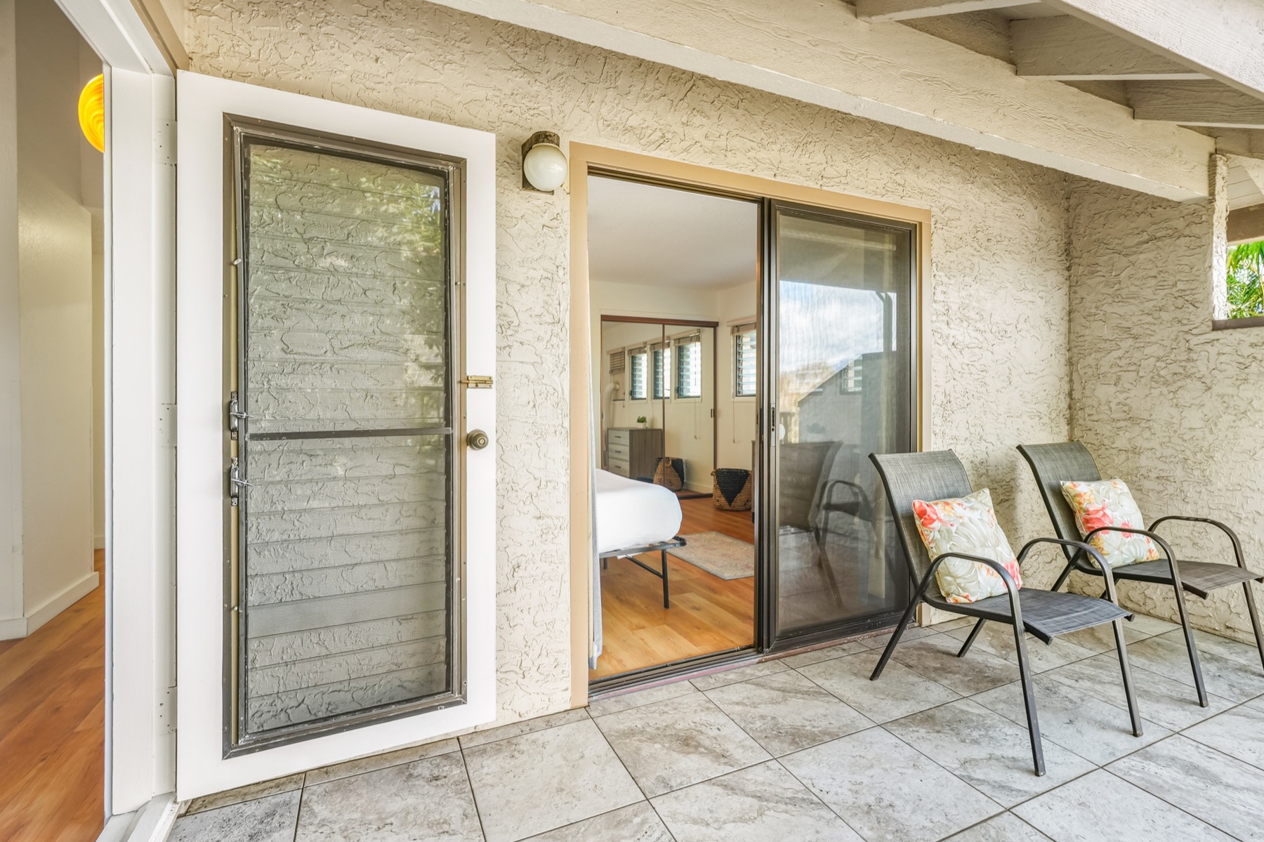 1901 Poipu Road, Unit 924 Koloa, HI 96756 - Photo 11 of 27 a view of a room with dining area and glass door