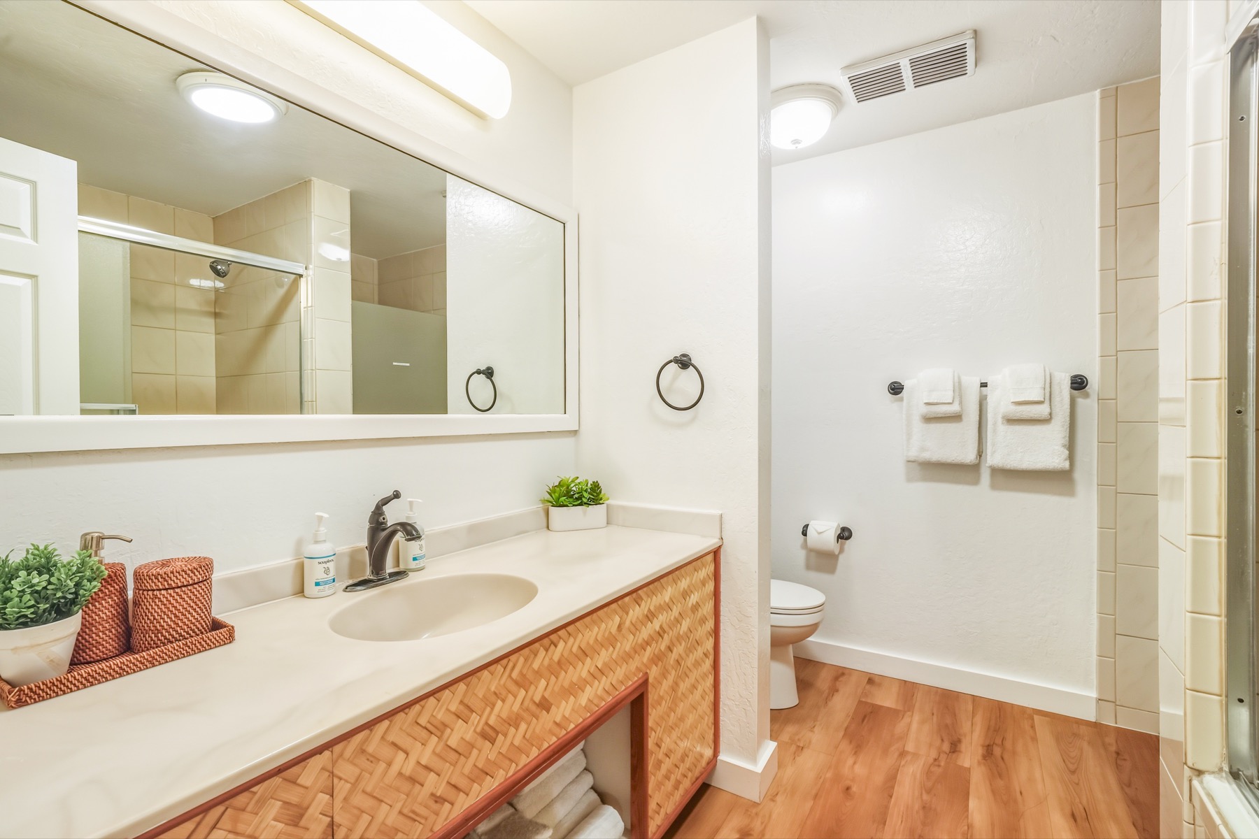 1901 Poipu Road, Unit 924 Koloa, HI 96756 - Photo 13 of 27 a bathroom with a sink a toilet and shower