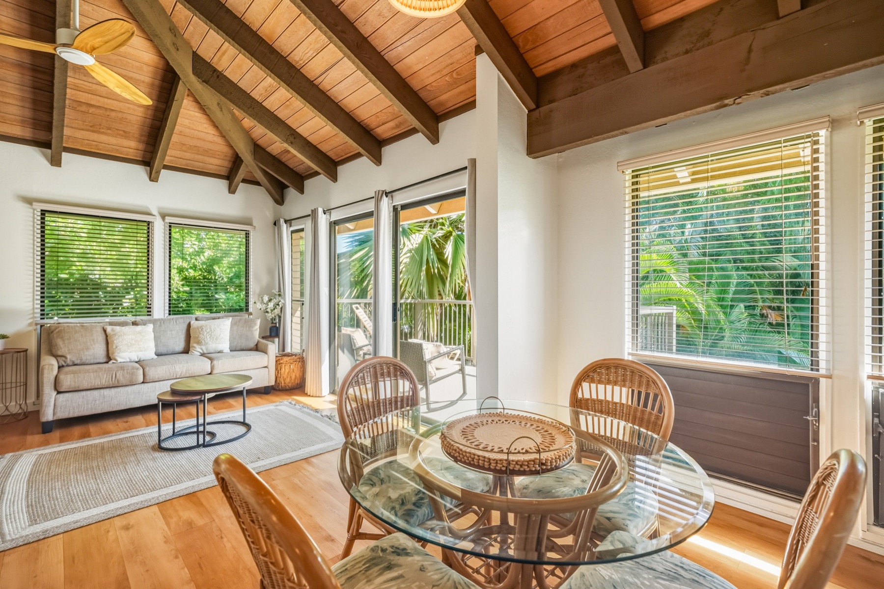 1901 Poipu Road, Unit 924 Koloa, HI 96756 - Photo 2 of 27 a living room with furniture and a large window