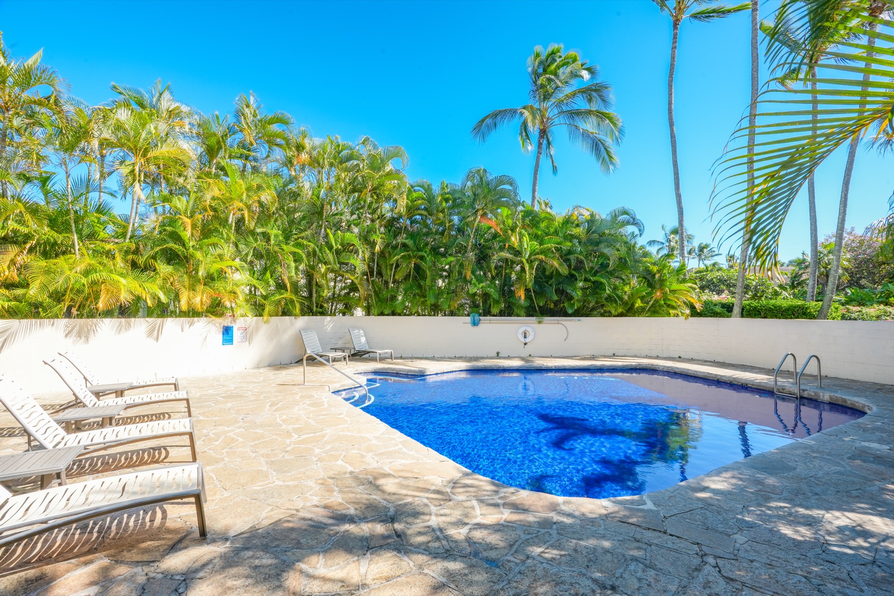 1901 Poipu Road, Unit 924 Koloa, HI 96756 - Photo 23 of 27 a view of swimming pool with a yard