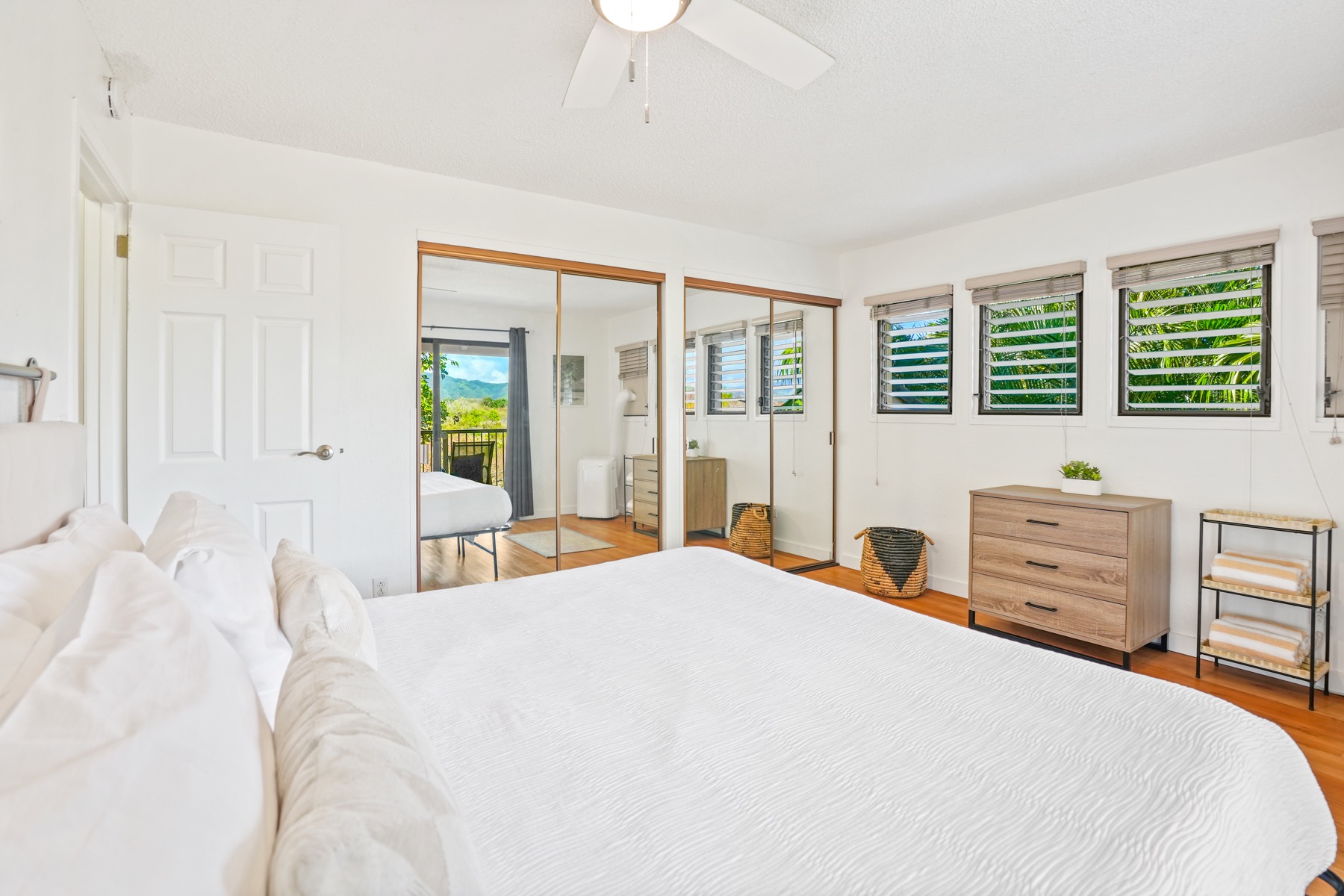 1901 Poipu Road, Unit 924 Koloa, HI 96756 - Photo 10 of 27 a bedroom with a bed and a large window