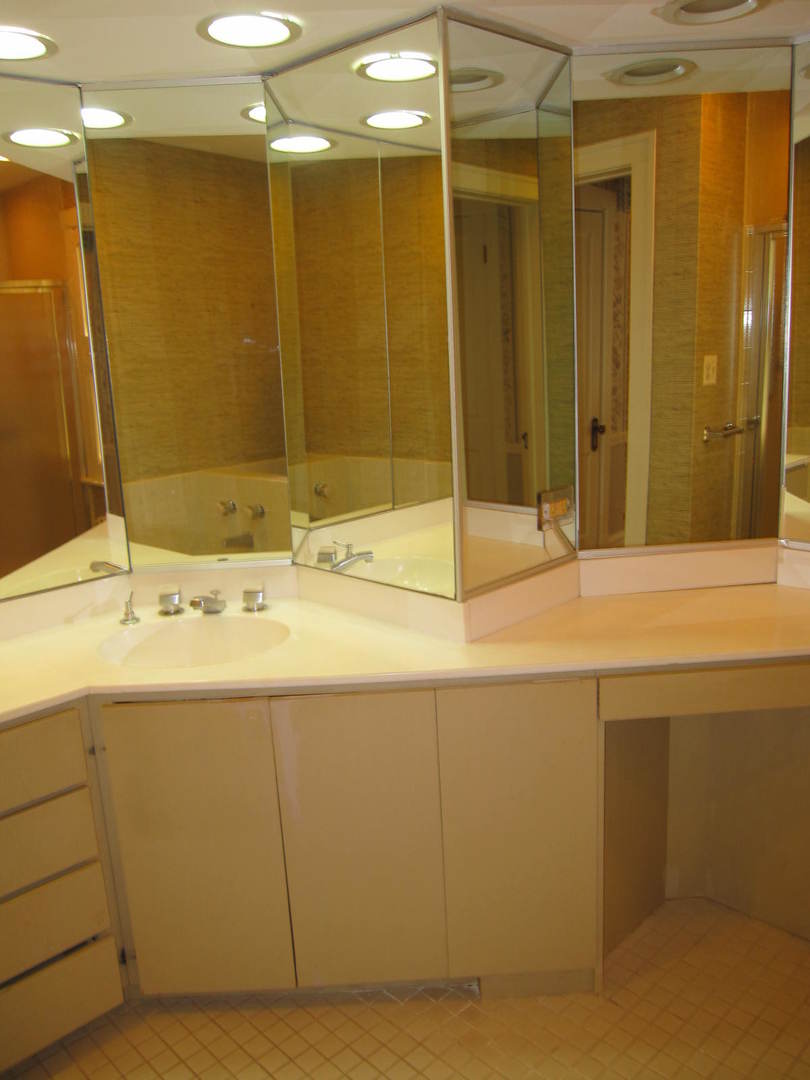 71 North Cowley Road Riverside, IL 60546 - Photo 17 of 23 a bathroom with a sink and a mirror
