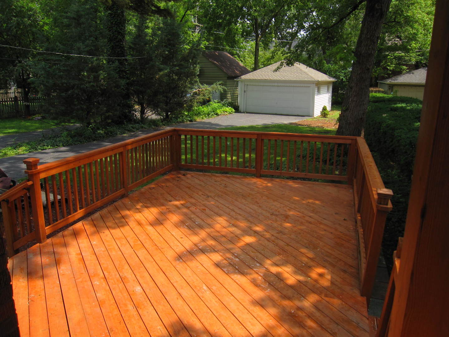 71 North Cowley Road Riverside, IL 60546 - Photo 20 of 23 a view of balcony with wooden floor and yard