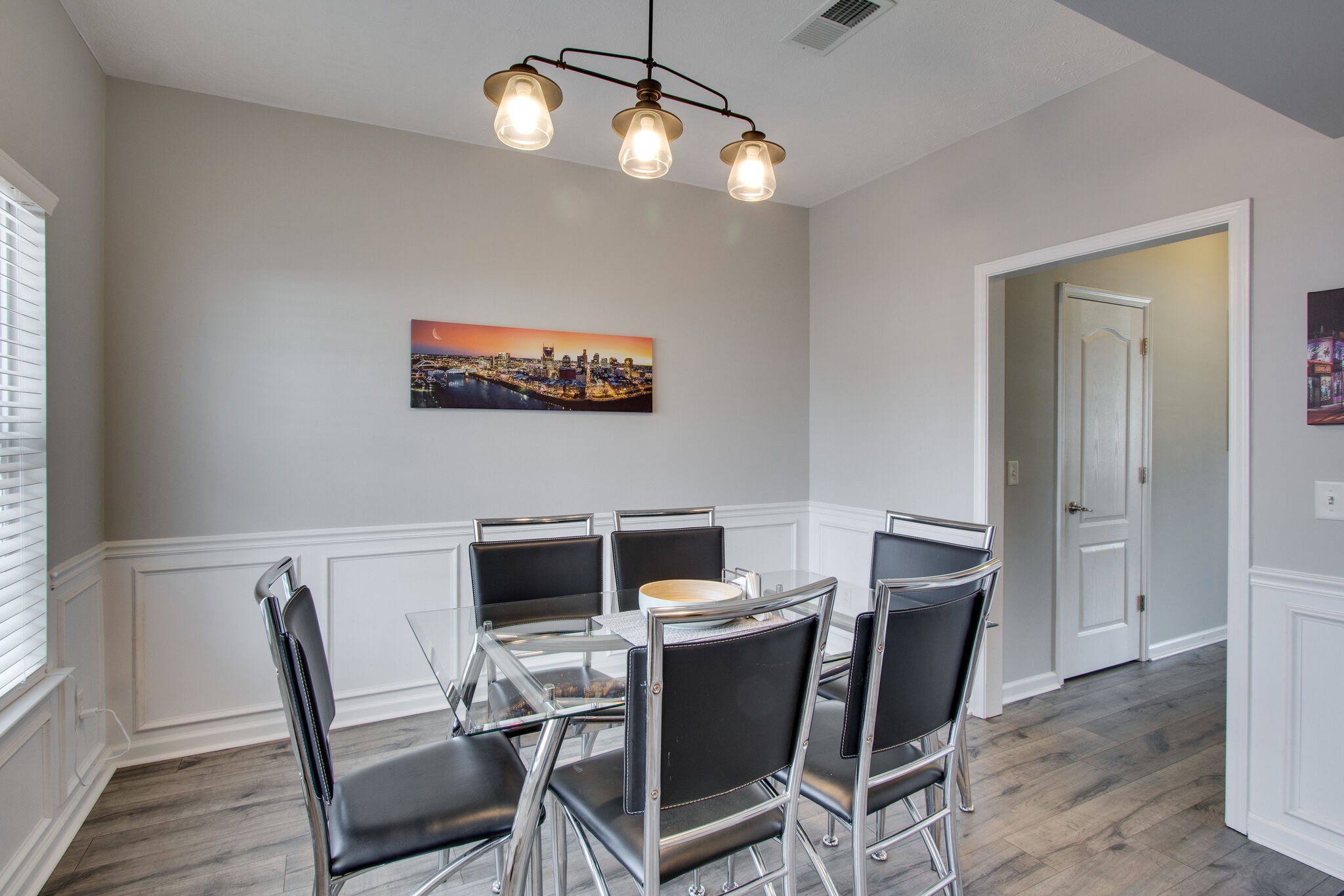 284 Meigs Drive, Unit D24 Murfreesboro, TN 37128 - Photo 8 of 16 a view of a dining room with furniture and wooden floor
