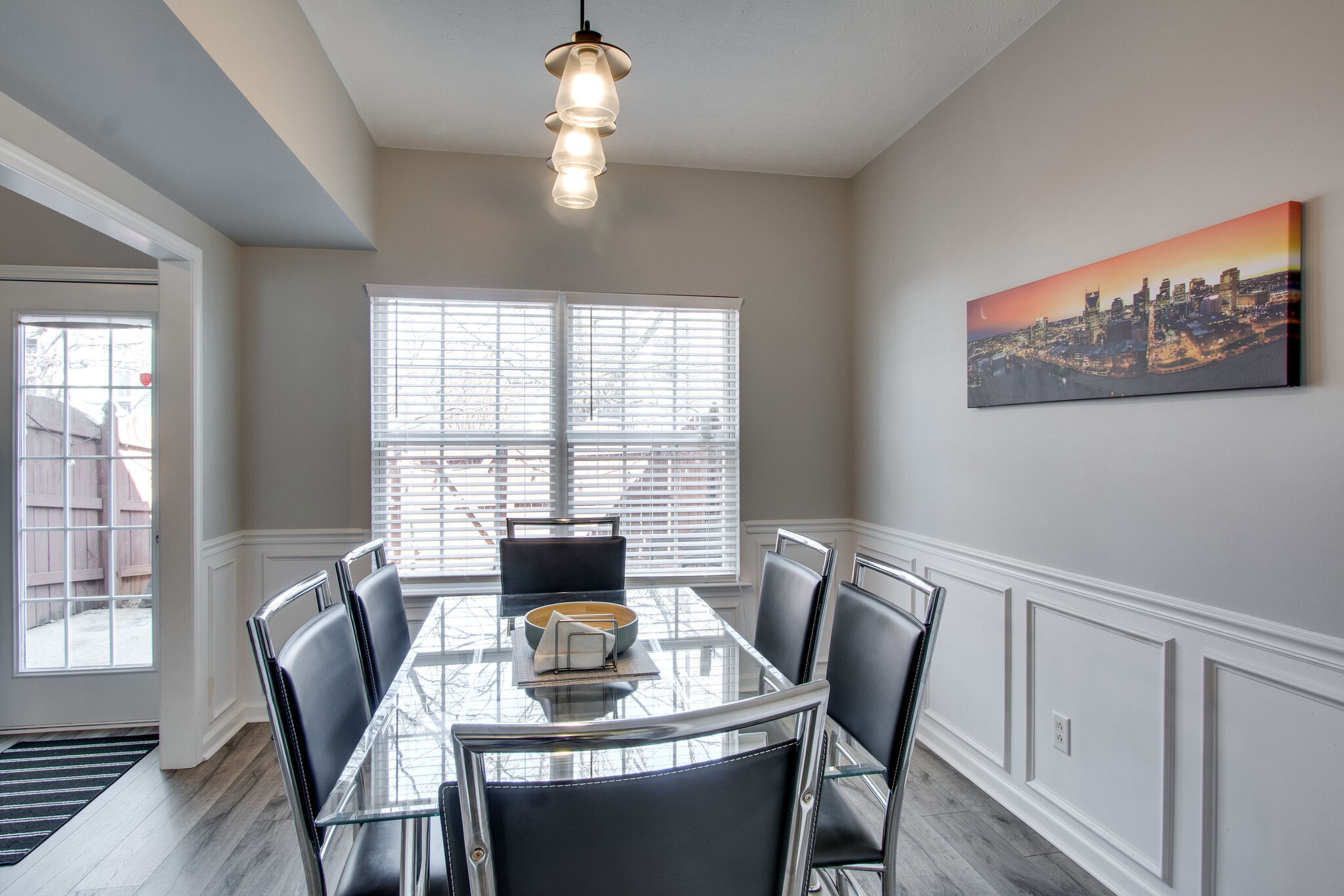284 Meigs Drive, Unit D24 Murfreesboro, TN 37128 - Photo 9 of 16 a view of a dining room with furniture window and wooden floor
