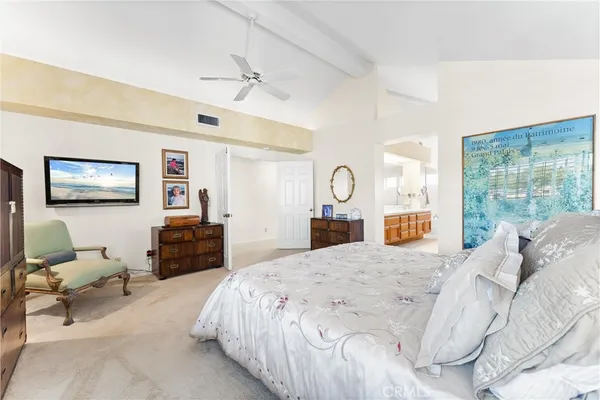 a bed room with a bed and window