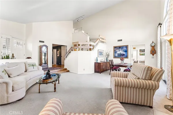 a living room with furniture and a couch