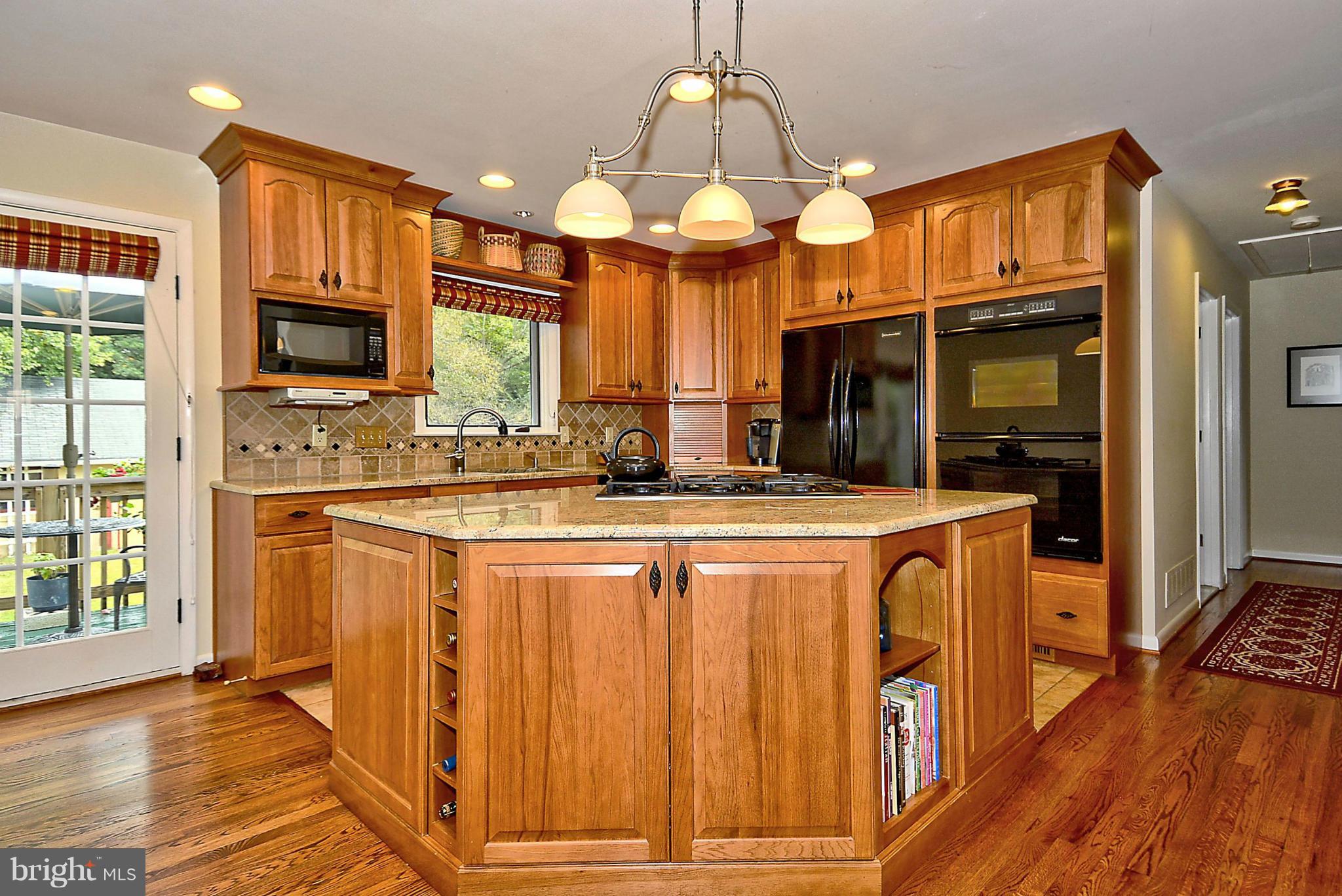 1344 Brenda Road Severn, MD 21144 - Photo 12 of 30 Kitchen w/Cooktop Center Island / Granite Counters