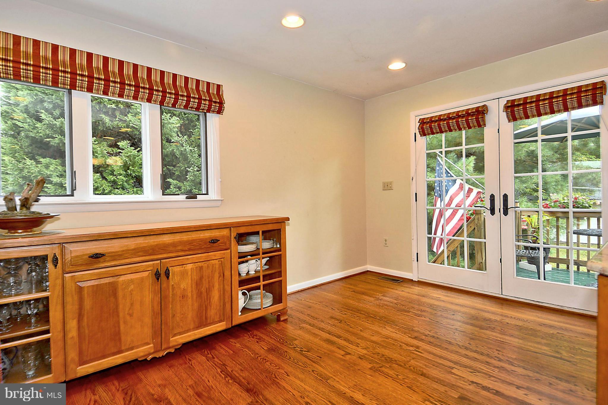 1344 Brenda Road Severn, MD 21144 - Photo 13 of 30 Dining Room Spilling Out to Barbecue Deck