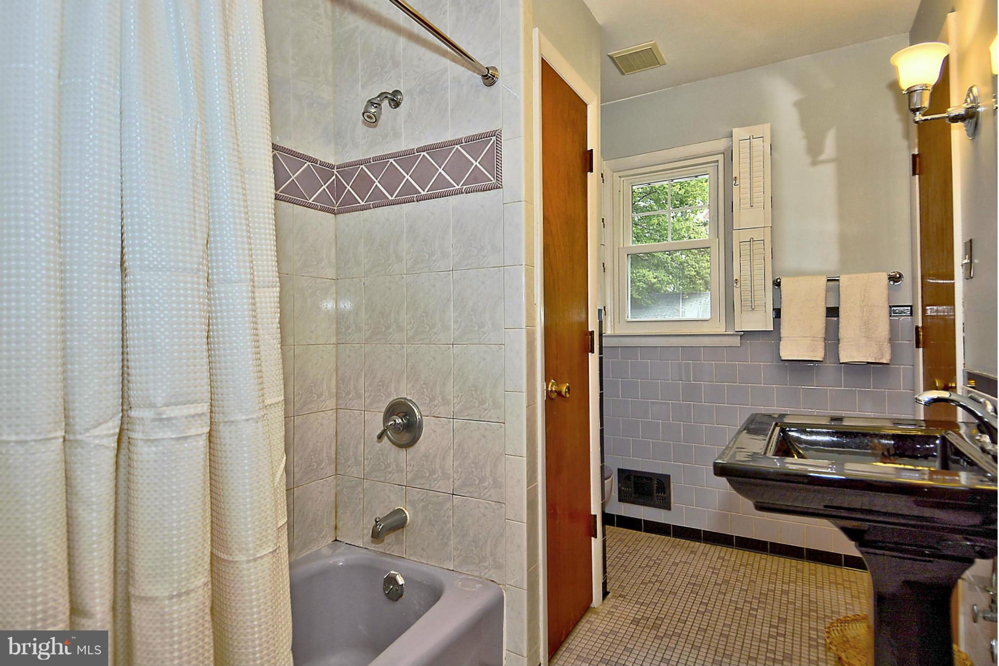 1344 Brenda Road Severn, MD 21144 - Photo 19 of 30 Revamped Inlaid Tile Bath / Designer Pedestal Sink
