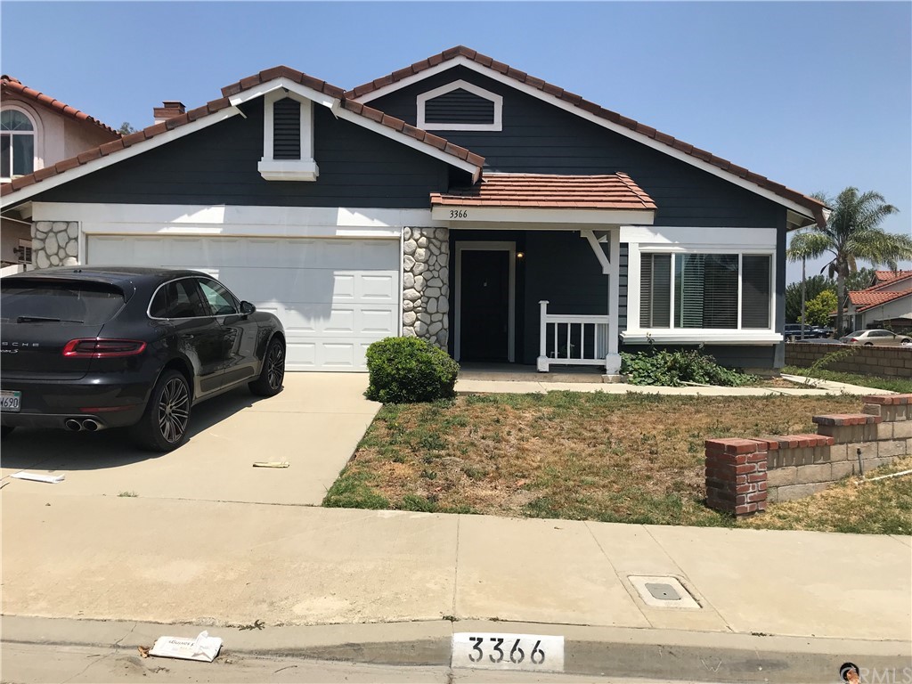 3366 Royal Ridge Road Chino Hills, CA 91709 - Photo 1 of 1 a front view of a house with a yard