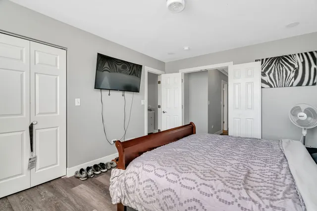 a bathroom with a tub and shower