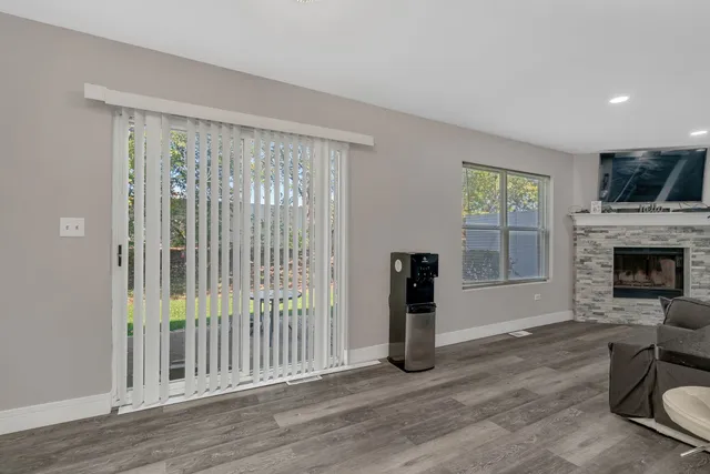 a kitchen with stainless steel appliances a refrigerator and a stove top oven