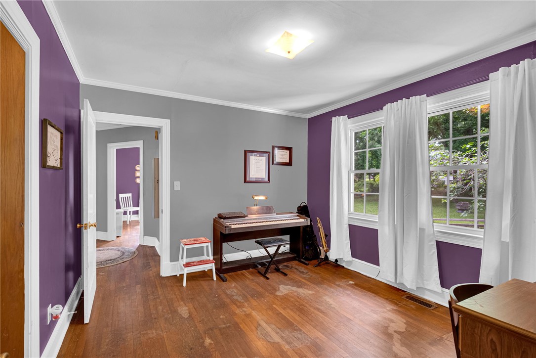 102 Graham Honea Path, SC 29654 - Photo 15 of 29 Hardwood flooring extends throughout this versatile space, perfect for a home office, creative studio or 3rd Bedroom.