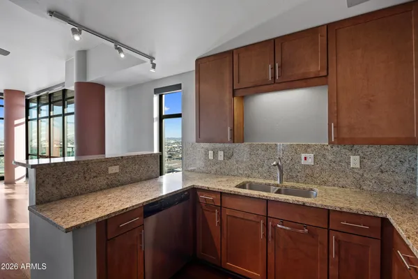 a kitchen with a sink and a cabinets