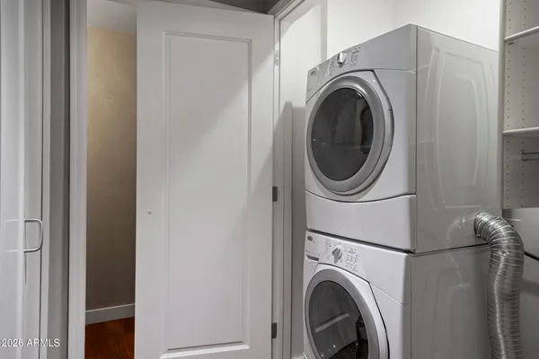 a utility room with dryer and washer