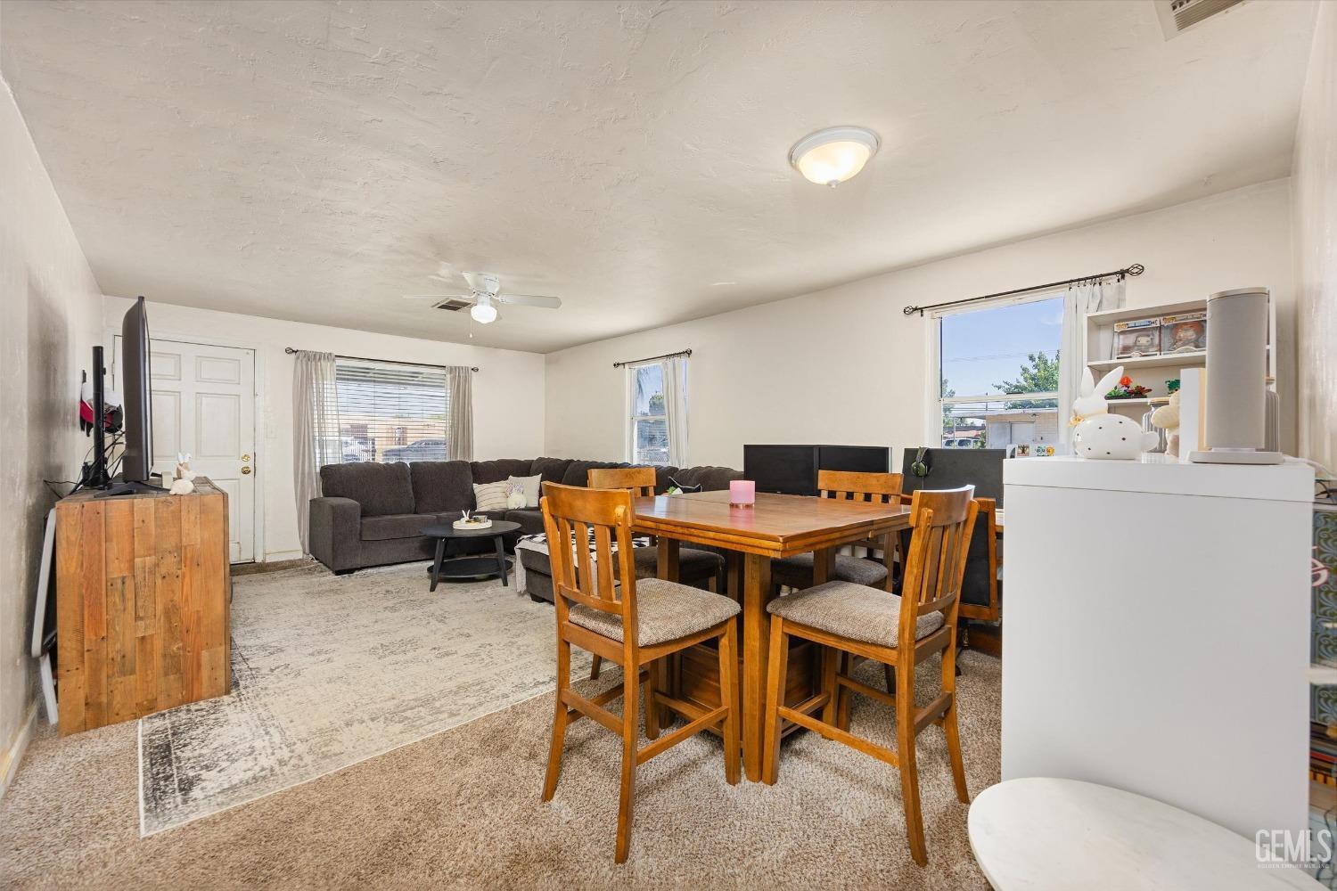Undisclosed Address Bakersfield, CA 93304 - Photo 13 of 25 a view of a dining room with furniture