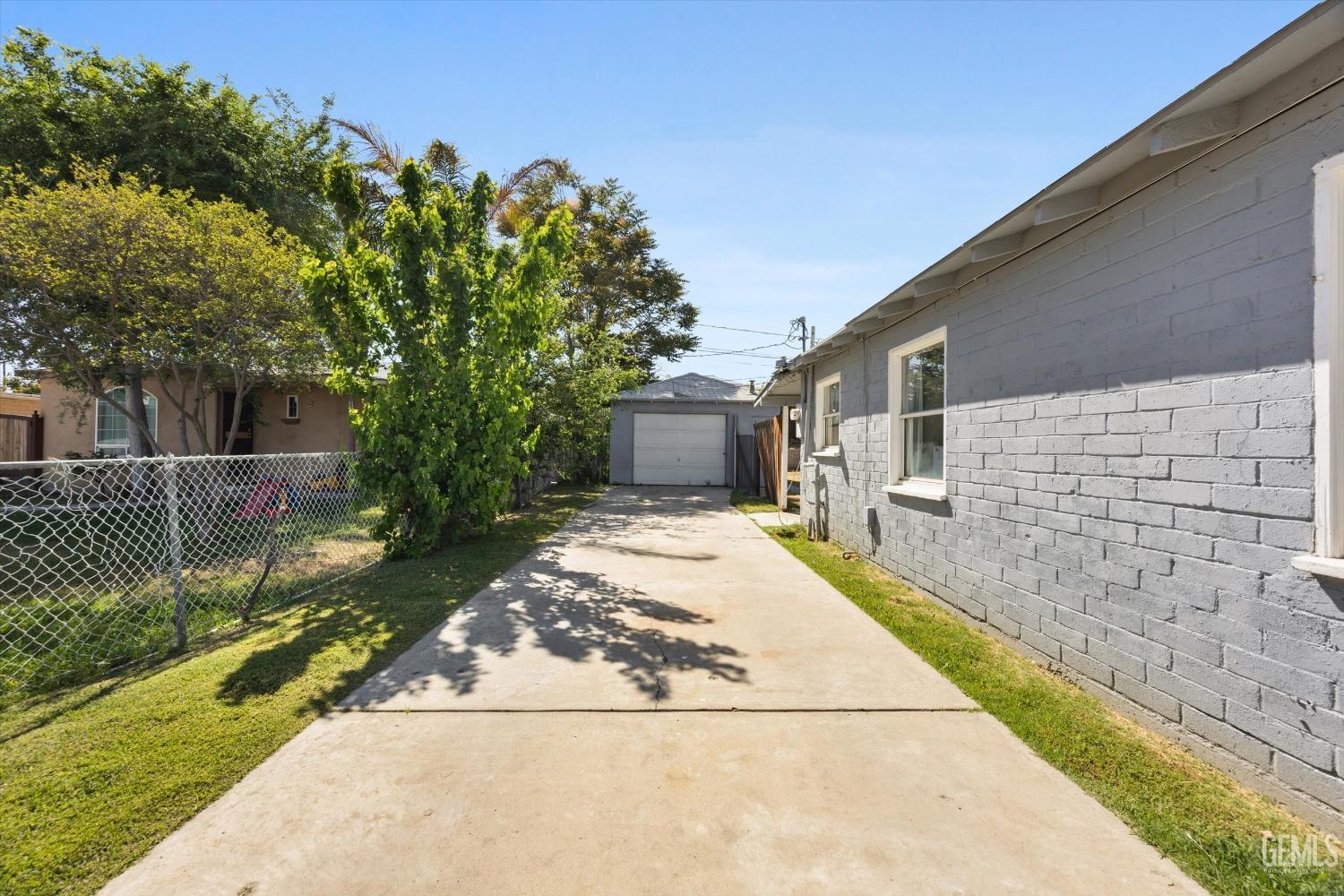 Undisclosed Address Bakersfield, CA 93304 - Photo 5 of 25 a view of a back yard of the house