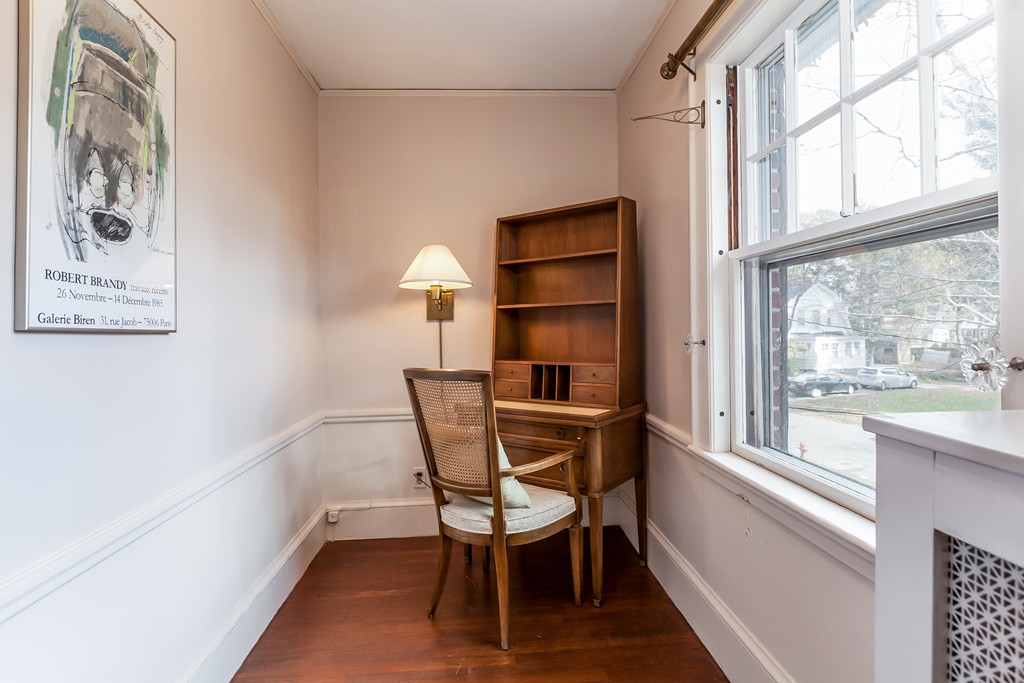 27 Samoset Road Newton, MA 02468 - Photo 8 of 18 a view of a room that has a window and a table in it