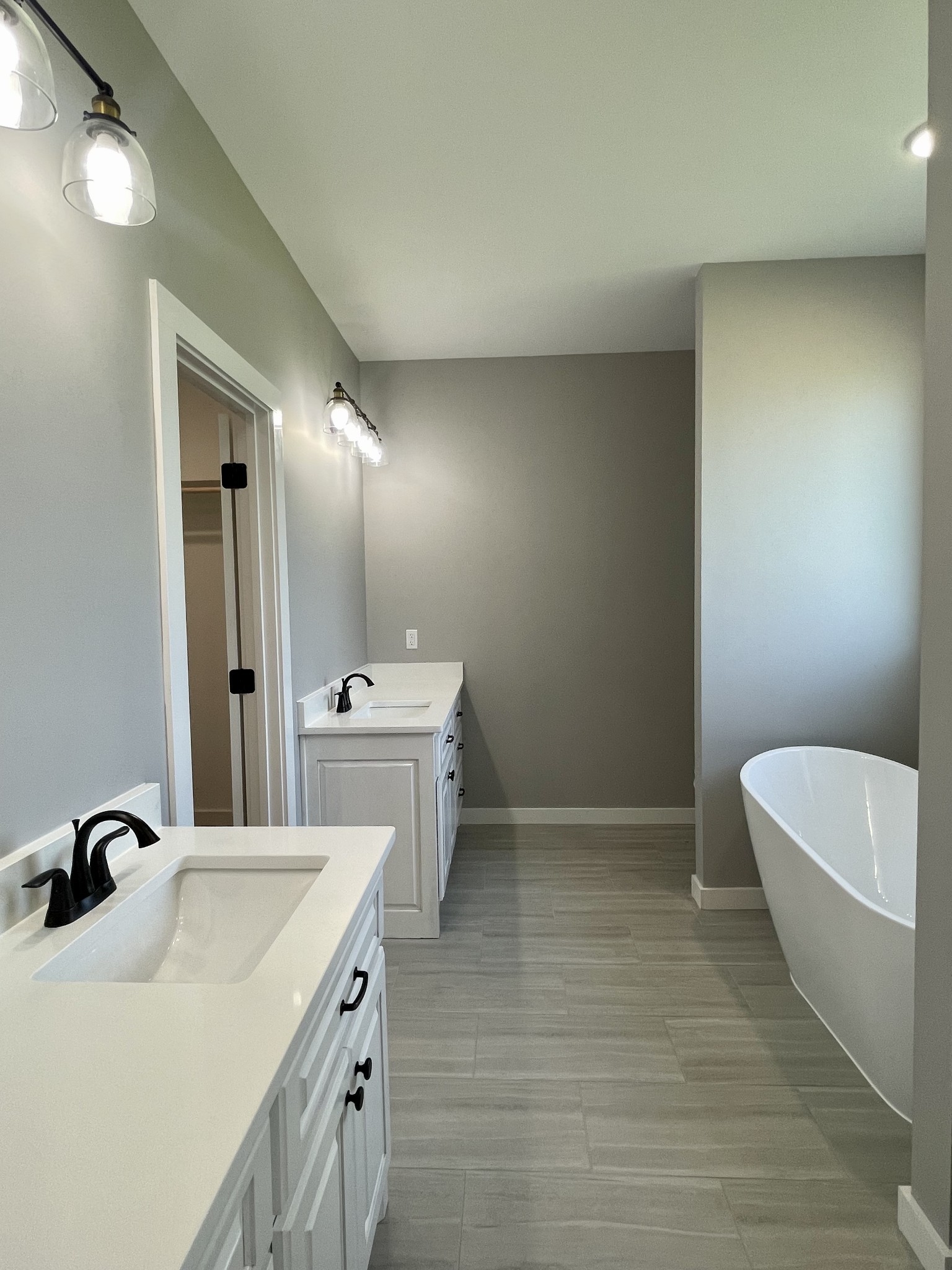 1460 Fall River Road Lawrenceburg, TN 38464 - Photo 16 of 31 a bathroom with a double vanity sink mirror and toilet