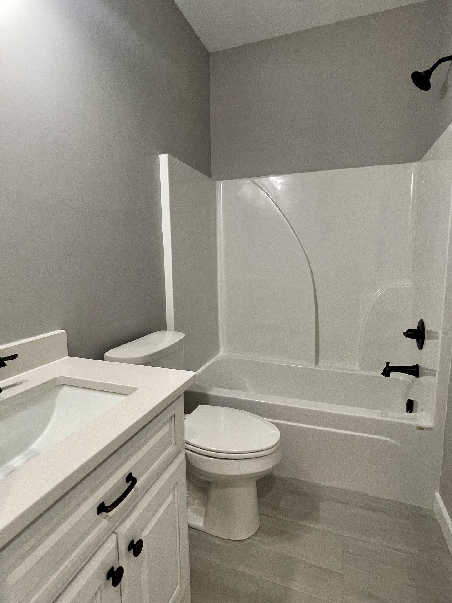1460 Fall River Road Lawrenceburg, TN 38464 - Photo 24 of 31 a bathroom with a sink a toilet and a bathtub