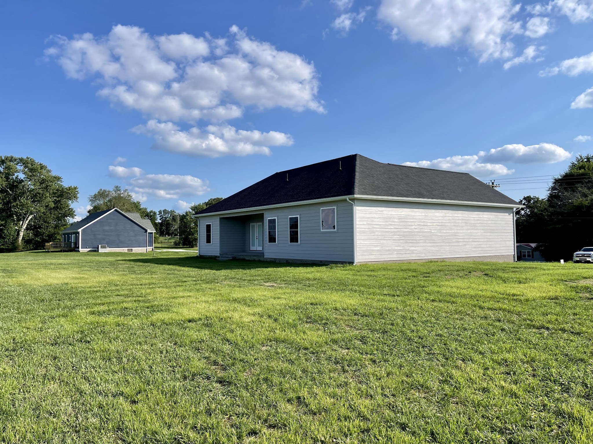 1460 Fall River Road Lawrenceburg, TN 38464 - Photo 27 of 31 a front view of a house with garden