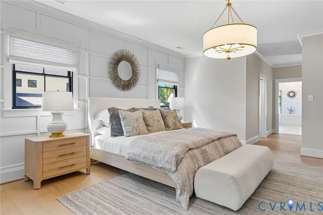 a bedroom with bed and window