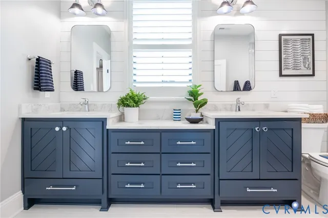 a spacious bedroom with bed and a window