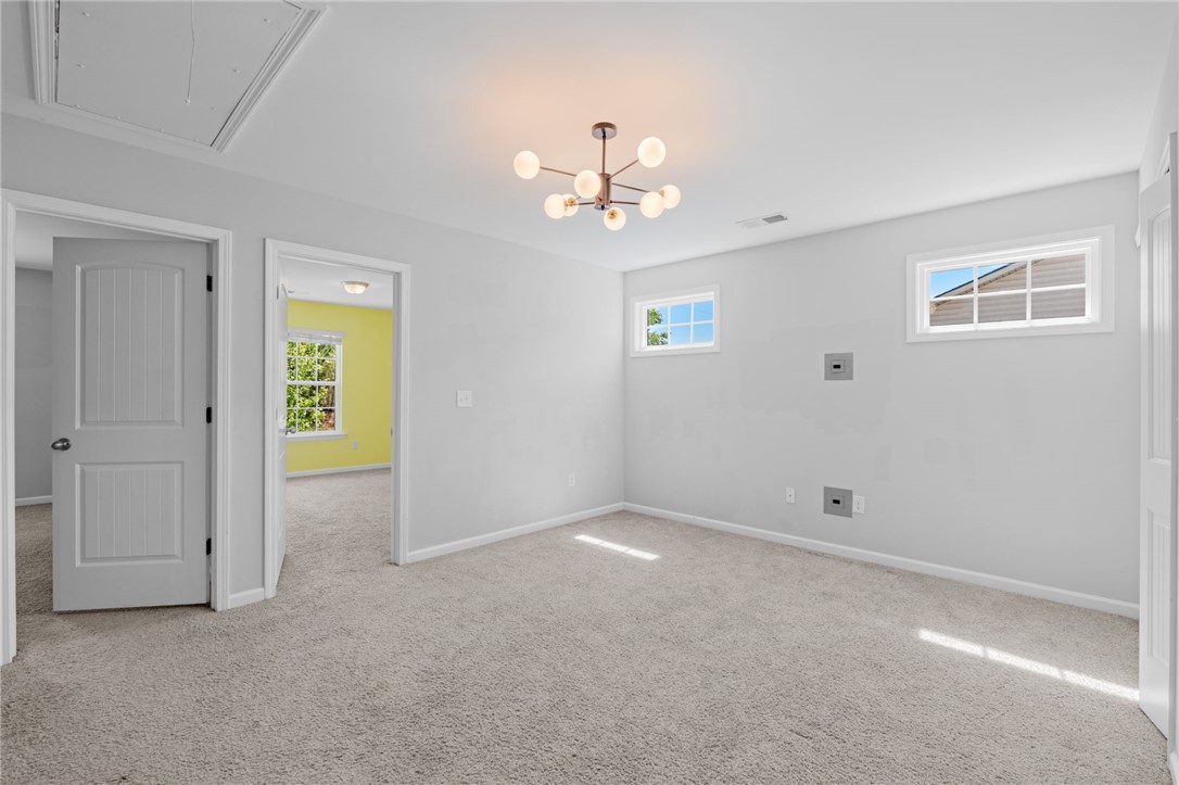 1237 Madden Bridge Road Central, SC 29630 - Photo 24 of 46 This spacious room offers comfort and versatility for various living arrangements.