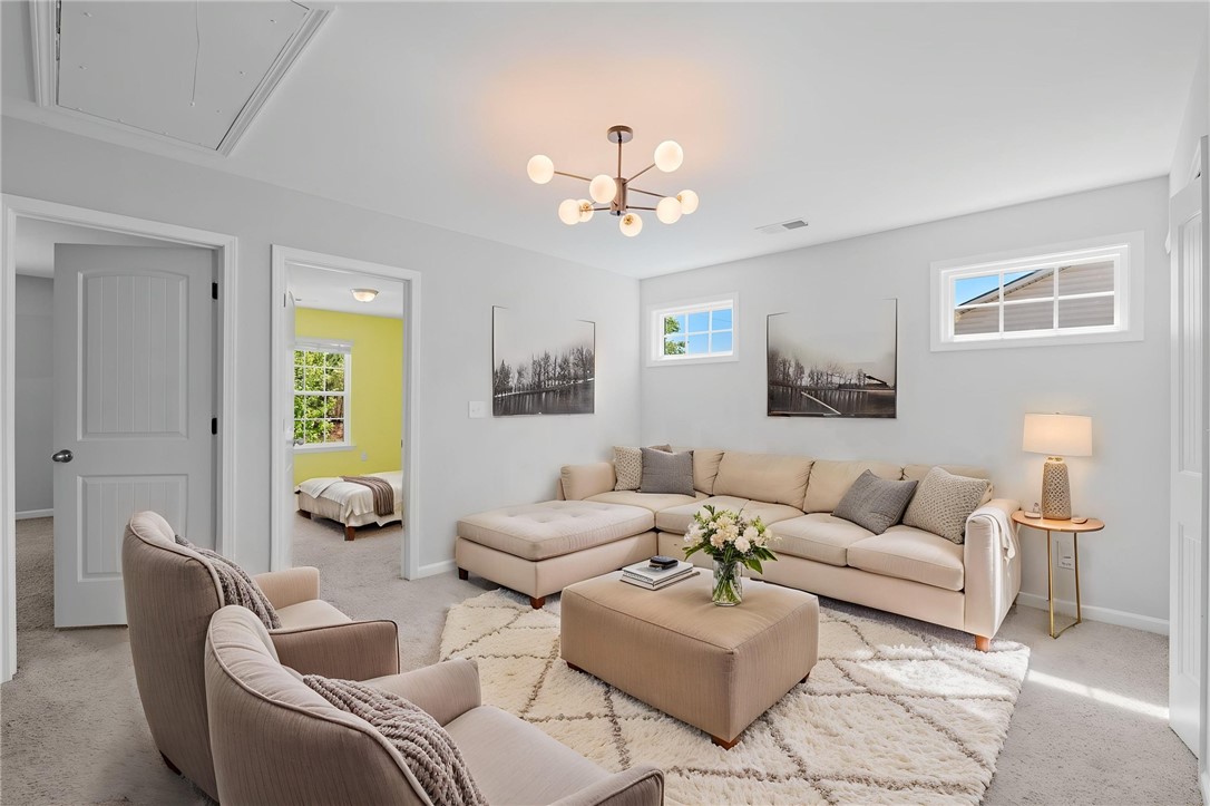 1237 Madden Bridge Road Central, SC 29630 - Photo 25 of 46 This bright and airy living space offers comfort and style with abundant natural light.