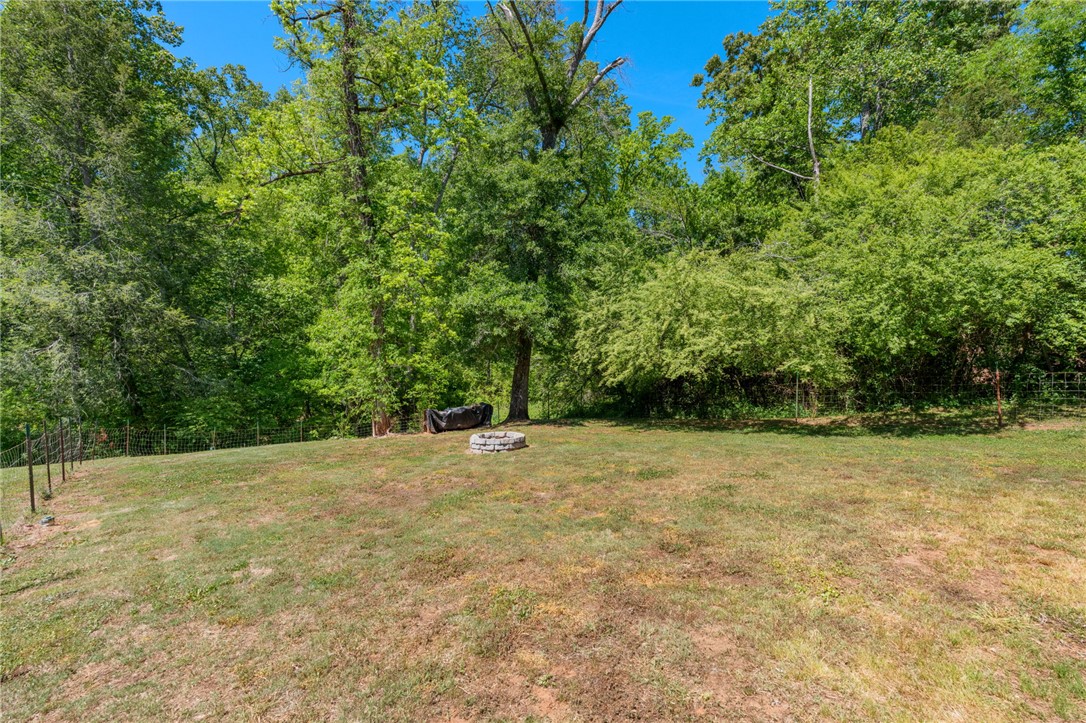 1237 Madden Bridge Road Central, SC 29630 - Photo 39 of 46 This spacious yard offers a perfect setting for outdoor relaxation and entertaining.
