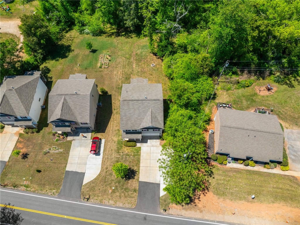 1237 Madden Bridge Road Central, SC 29630 - Photo 40 of 46 This captivating aerial view showcases the serene surroundings of a residential property.