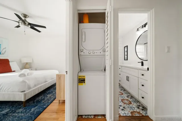 a en suite bathroom with a sink and mirror