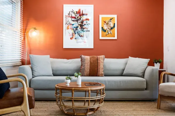 a living room with furniture and a window