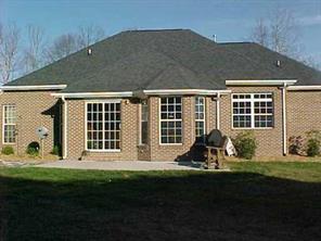 1353 Crown Ridge Drive Fort Mill, SC 29708 - Photo 8 of 8 a front view of a house with a garden