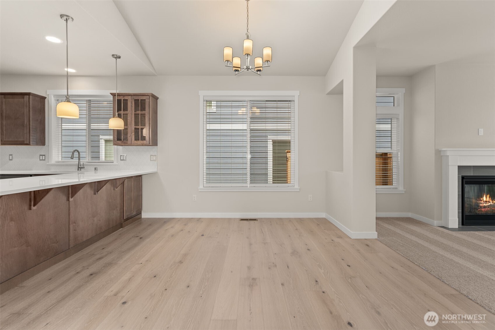 719 Maggee Street Southeast Lacey, WA 98513 - Photo 15 of 40 a spacious bathroom with a granite countertop sink a large mirror and a window