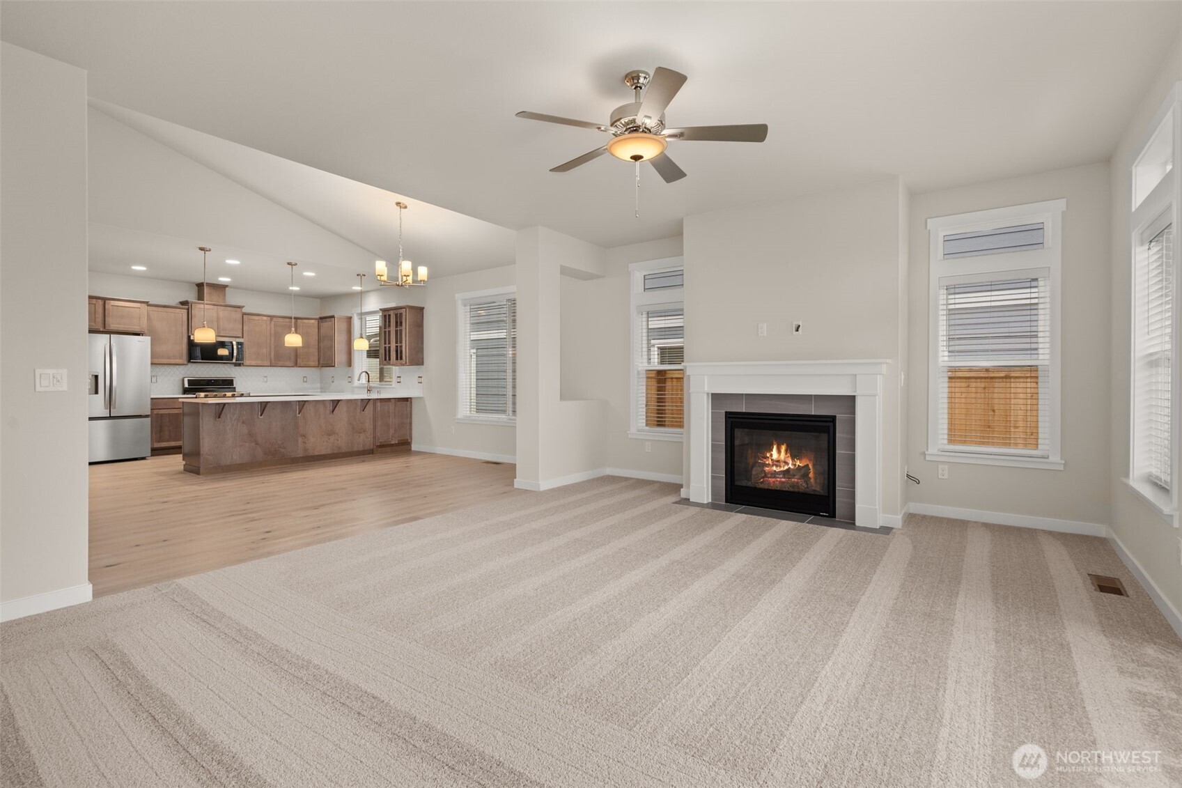 719 Maggee Street Southeast Lacey, WA 98513 - Photo 17 of 40 a view of a kitchen with furniture and a fireplace