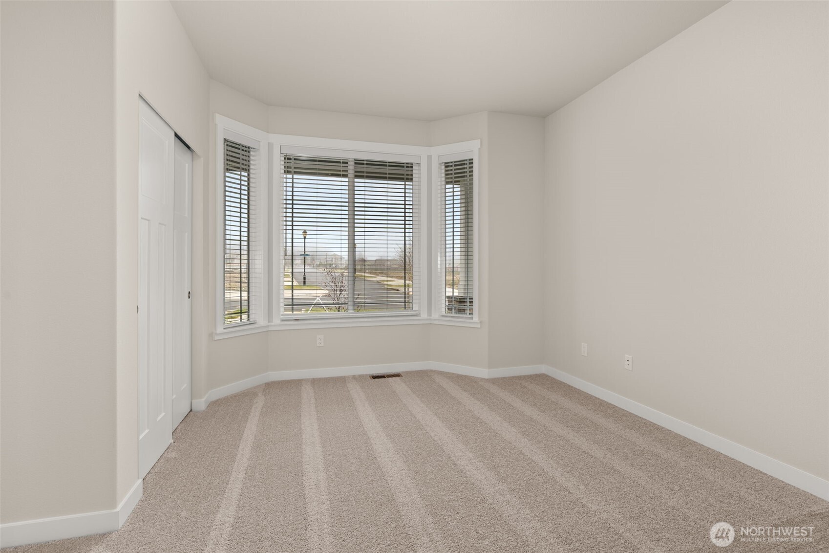 719 Maggee Street Southeast Lacey, WA 98513 - Photo 8 of 40 a view of an empty room with a window