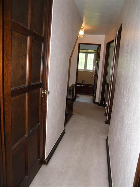 1310-1312 Cochran Road Pittsburgh, PA 15243 - Photo 6 of 17 Hallway leading to bedrooms 1310