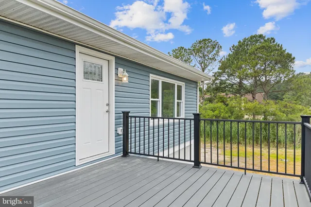 a view of a house with a deck