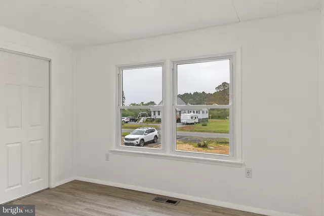 an empty room with window