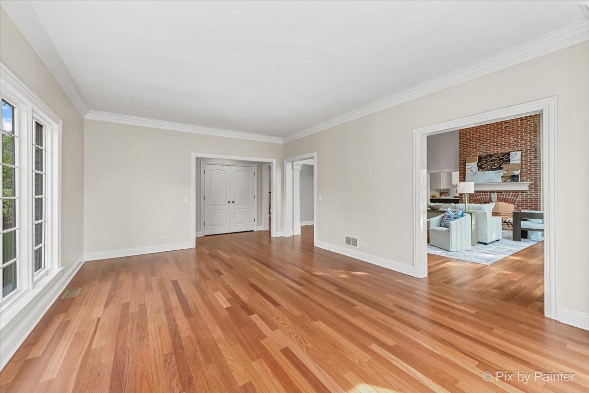 39W599 Walt Whitman Road St. Charles, IL 60175 - Photo 14 of 74 a view of a livingroom with wooden floor