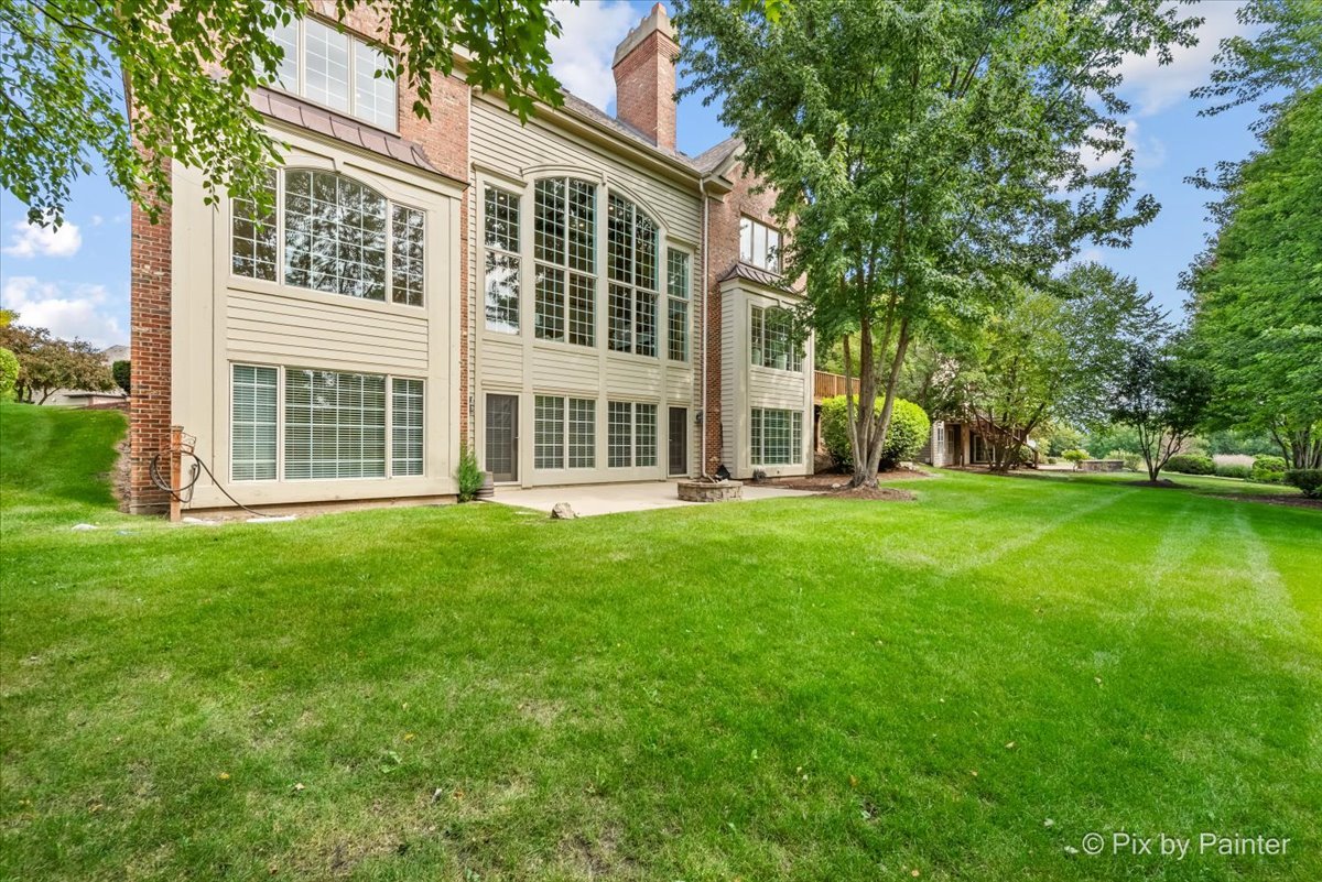 39W599 Walt Whitman Road St. Charles, IL 60175 - Photo 2 of 74 a view of house with backyard