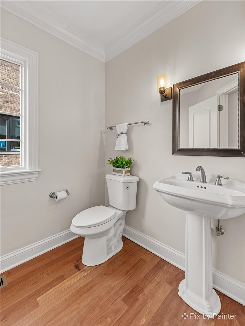 39W599 Walt Whitman Road St. Charles, IL 60175 - Photo 23 of 74 a bathroom with a sink toilet and a mirror