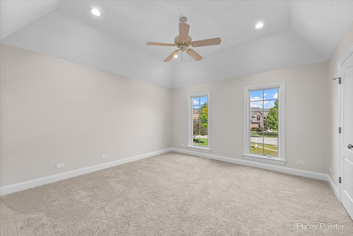 39W599 Walt Whitman Road St. Charles, IL 60175 - Photo 30 of 74 an empty room with windows and fan