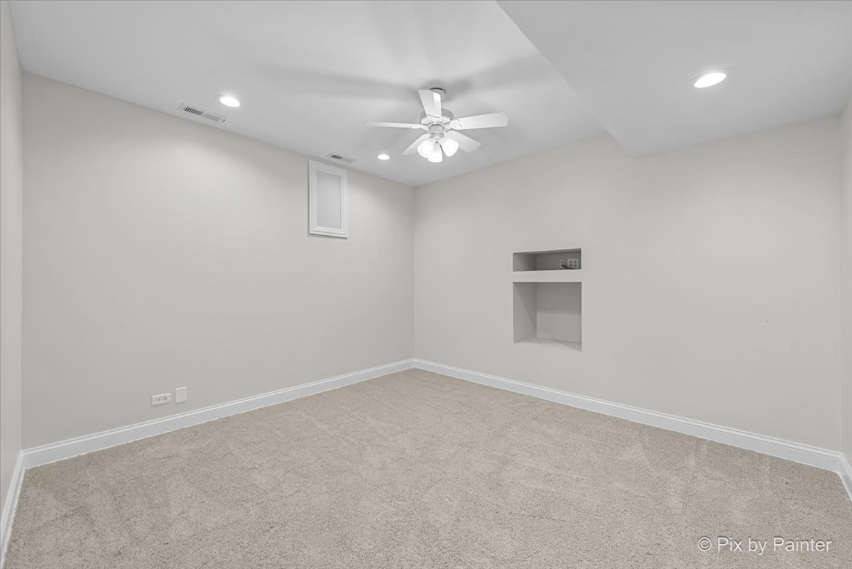39W599 Walt Whitman Road St. Charles, IL 60175 - Photo 43 of 74 an empty room with a fan & a ceiling fan