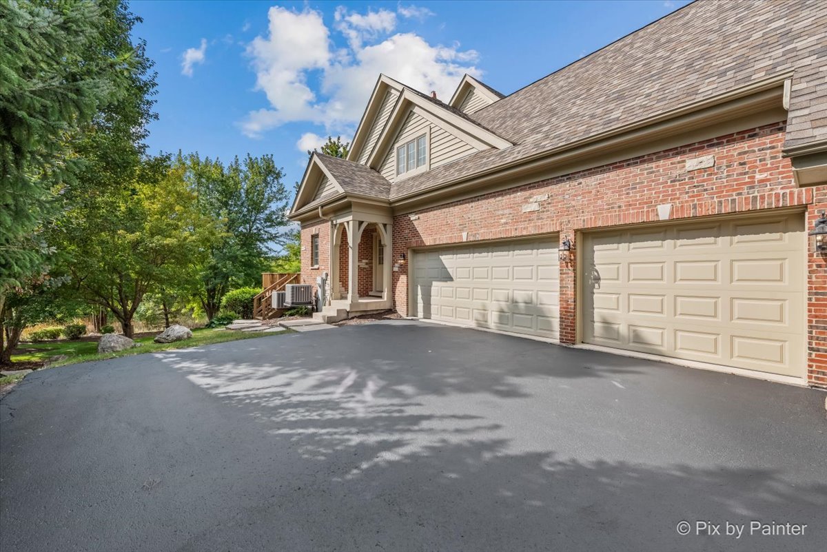 39W599 Walt Whitman Road St. Charles, IL 60175 - Photo 61 of 74 a view of a house with a outdoor space and porch