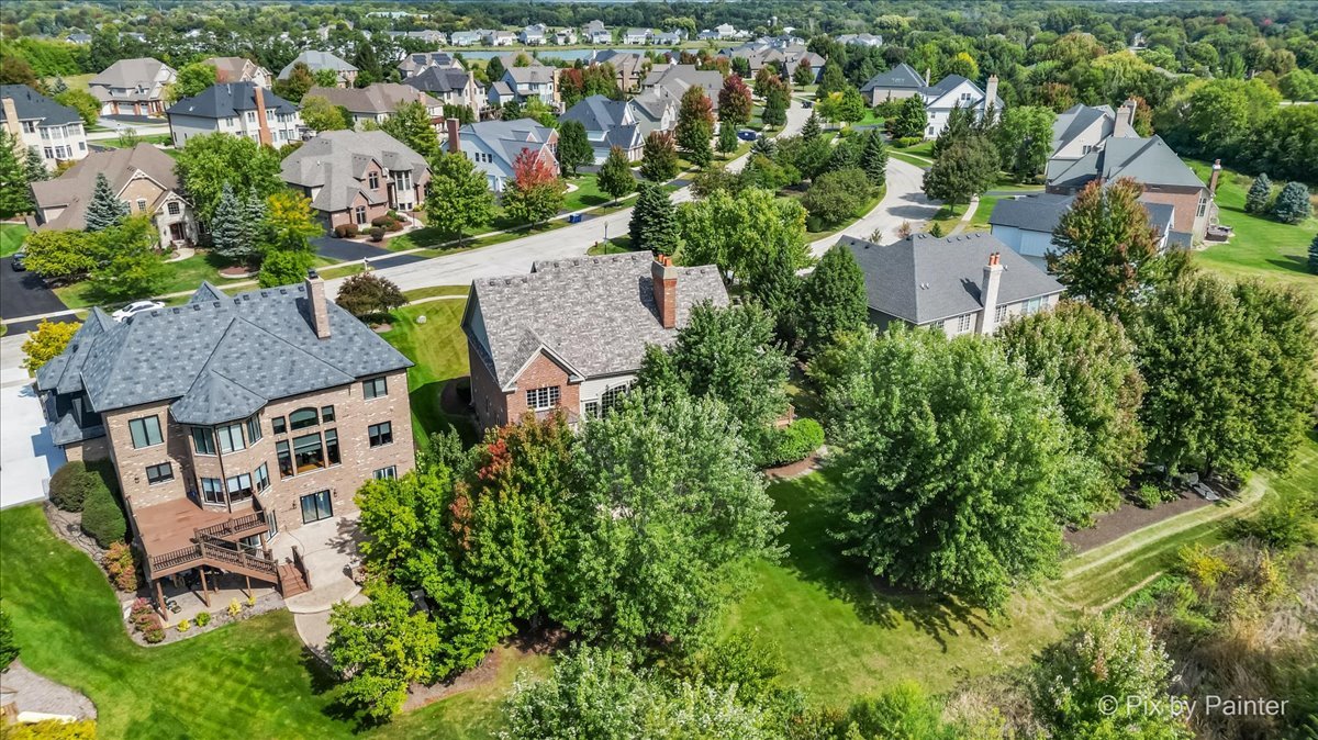 39W599 Walt Whitman Road St. Charles, IL 60175 - Photo 64 of 74 an aerial view of a house with garden space and street view